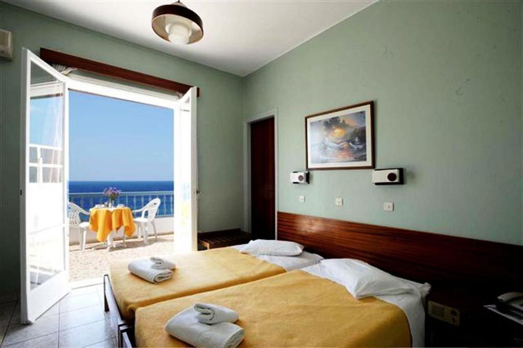 Hotel Asteria Tínos Pokoj fotografie