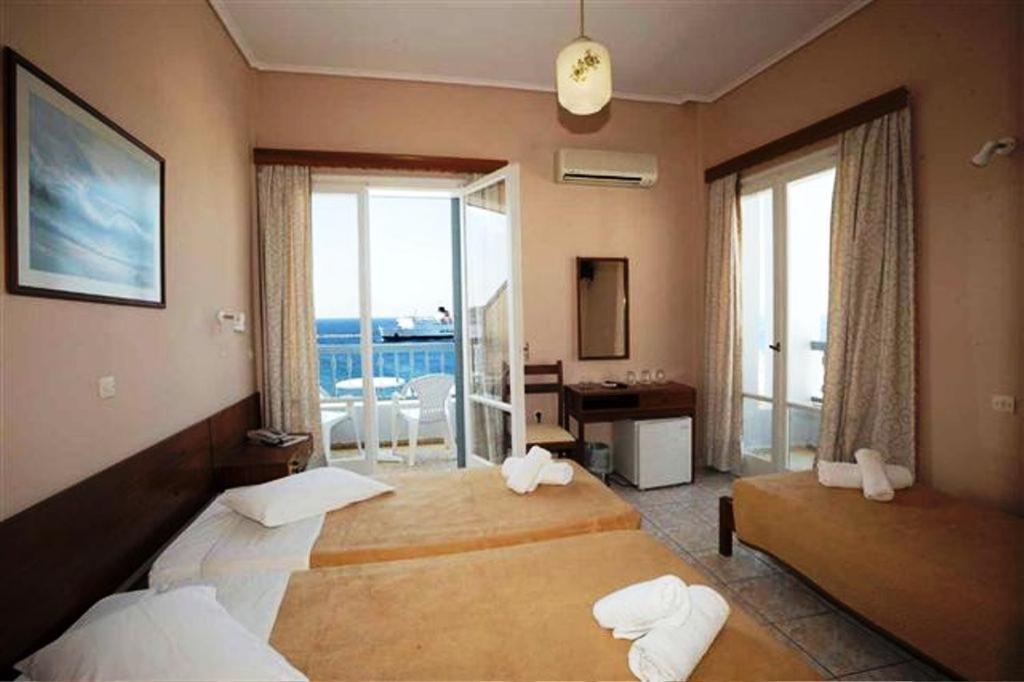Hotel Asteria Tínos Pokoj fotografie
